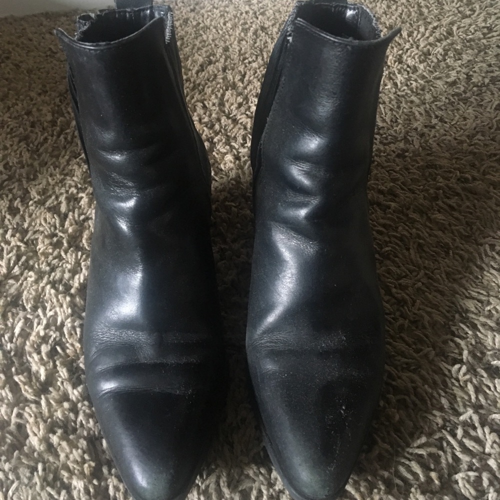 Black leather point toe Chelsea boots